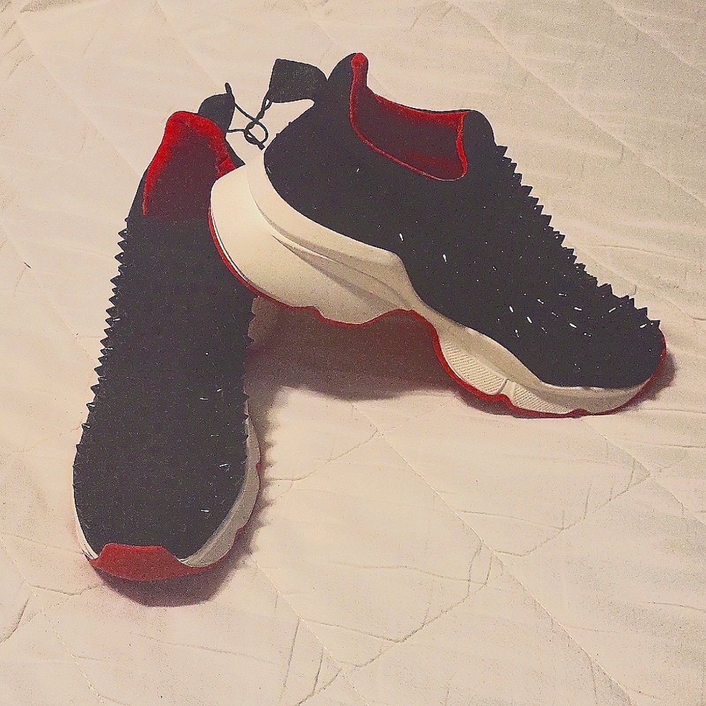 Black spiky sneakers